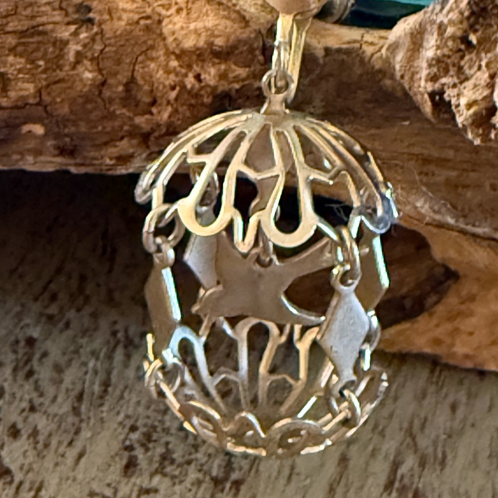 Elegant Gold Birdcage Pendant